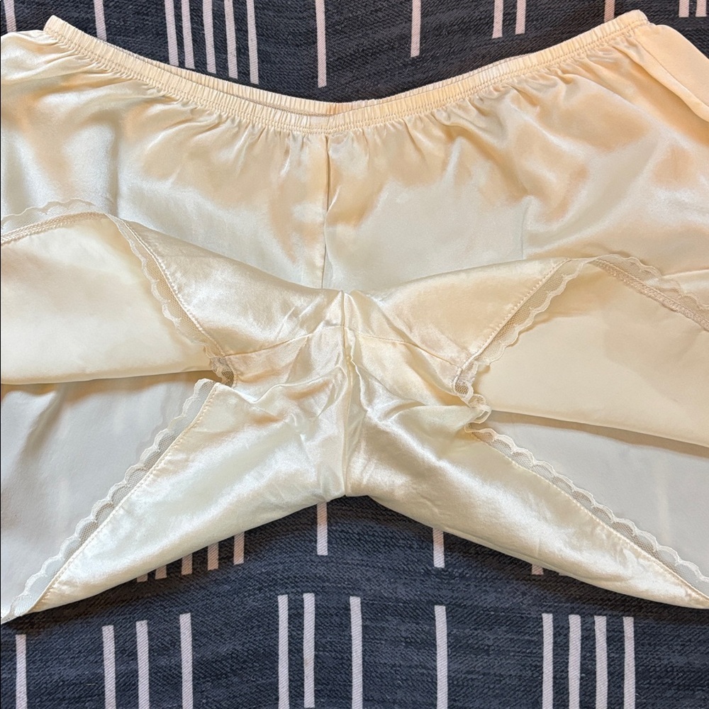 DONNI. Silk Tap Shorts in Light Yellow - Picture 8 of 17